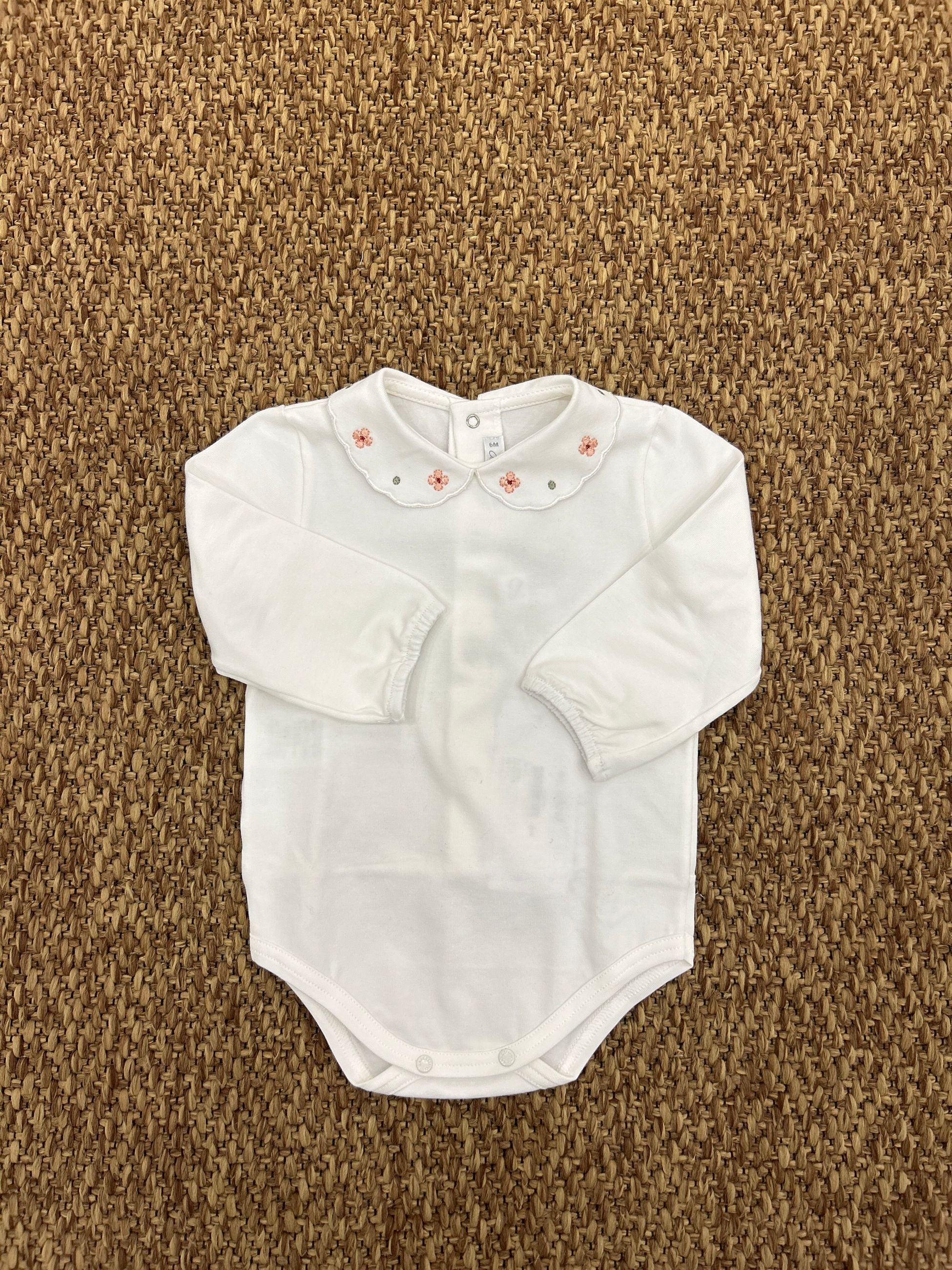 Body neonata fiorellini Barcellino