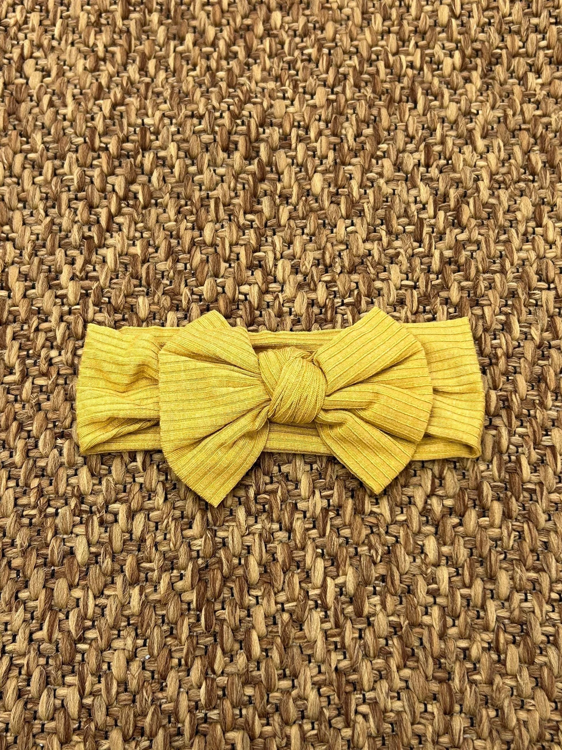 Fascetta bimba a costine con fiocco Siena