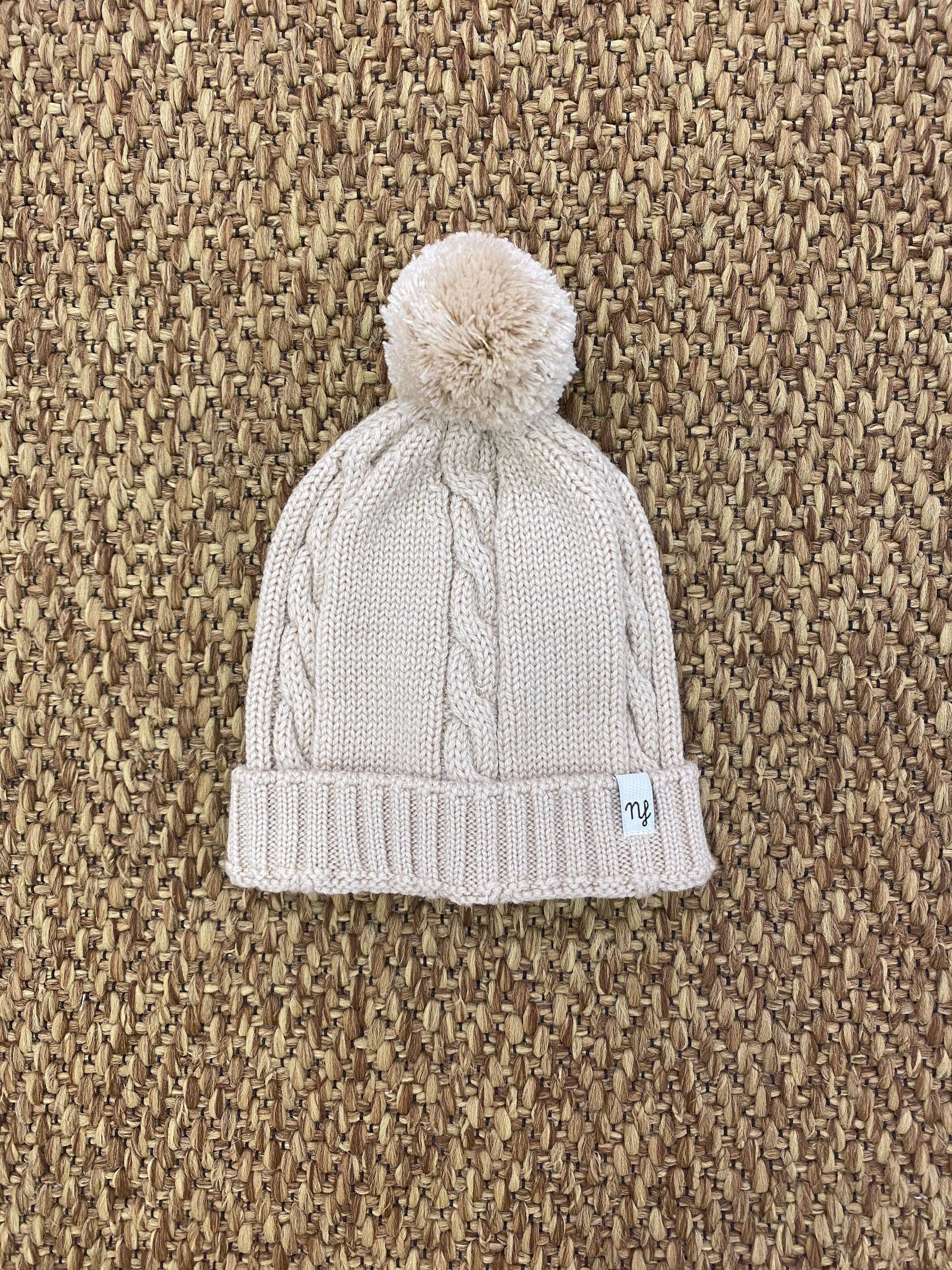 Cappello bambini a trecce con pon pon Nannafrufru