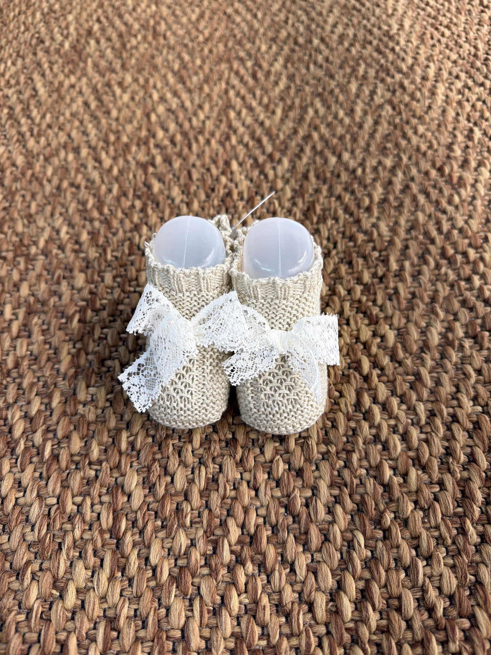 Babbucce neonata traforate con fiocchetto in pizzo Juliana
