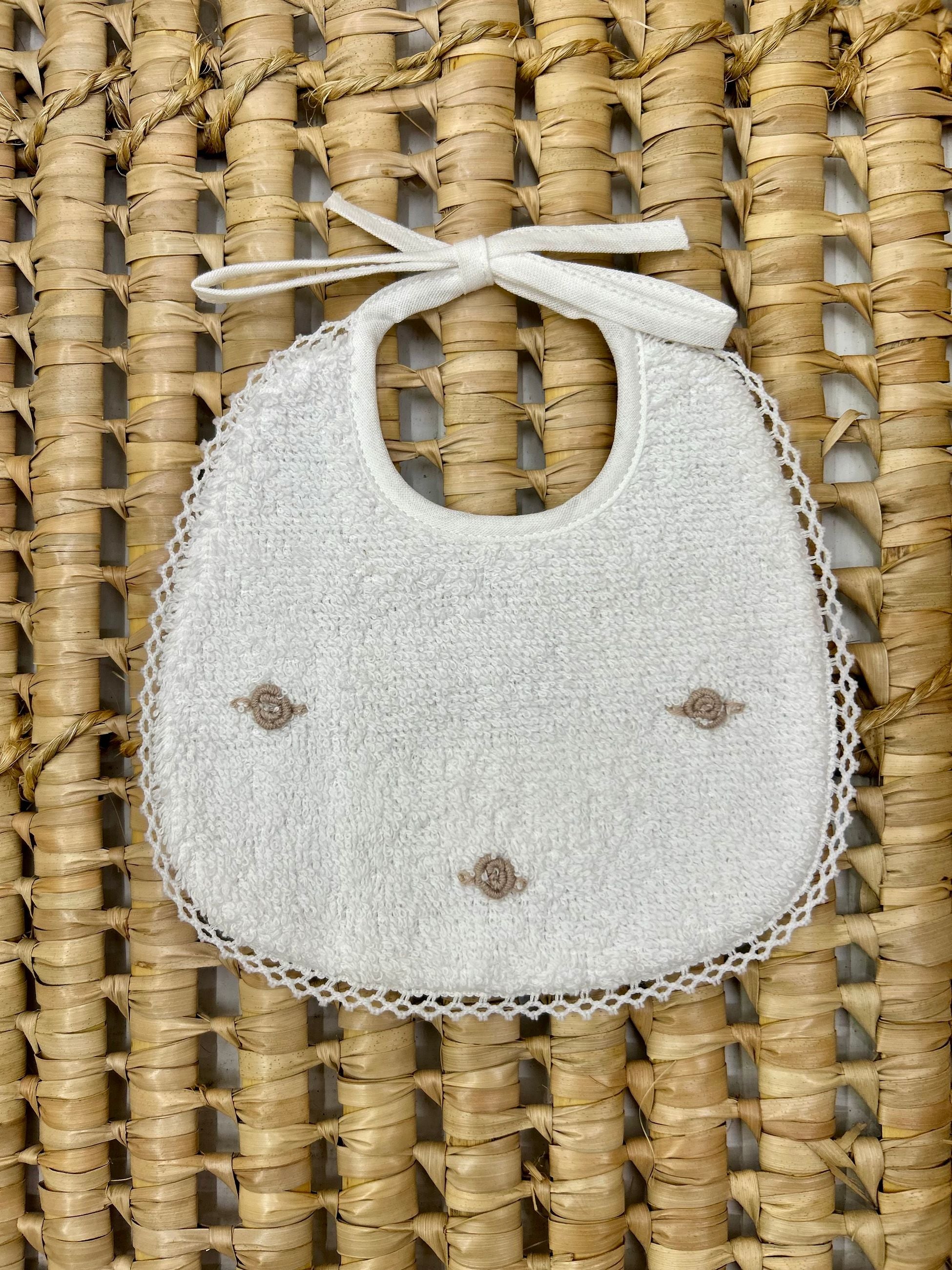 Bavetta neonata in spugna con roselline Artigian Baby