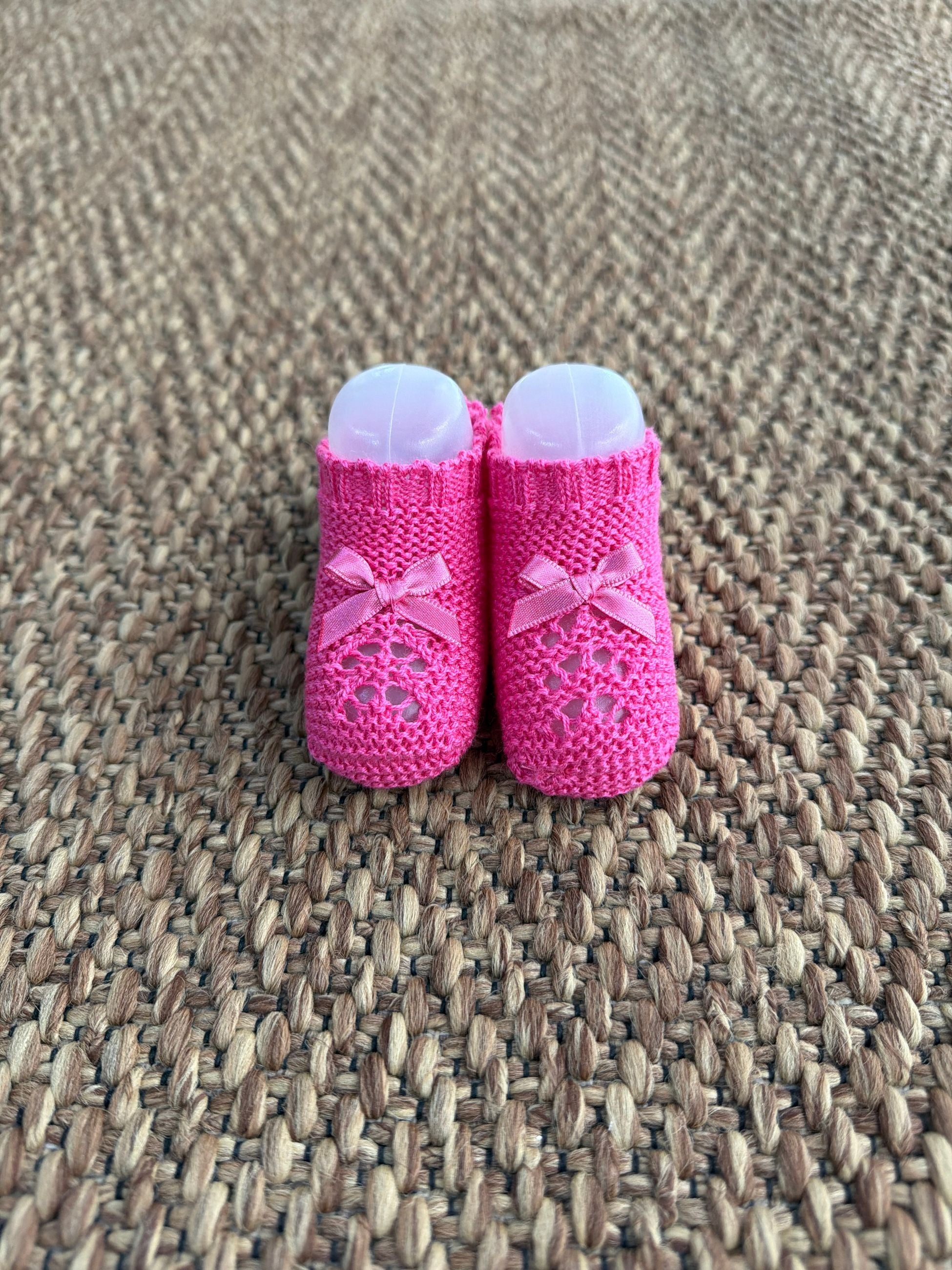 Babbucce neonata traforate con fiocchetto Juliana