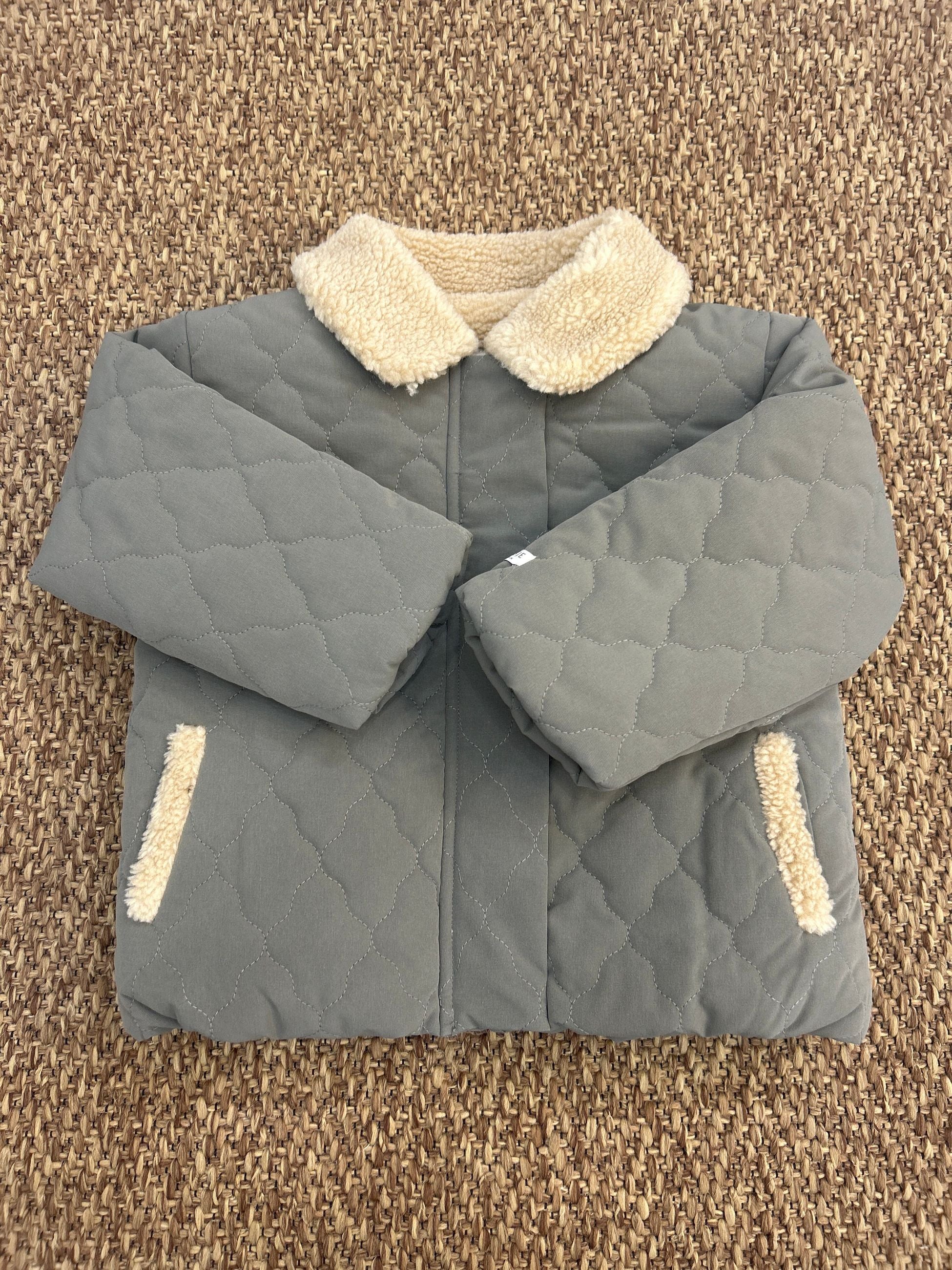 Giubbino bambino con collo teddy Donsje