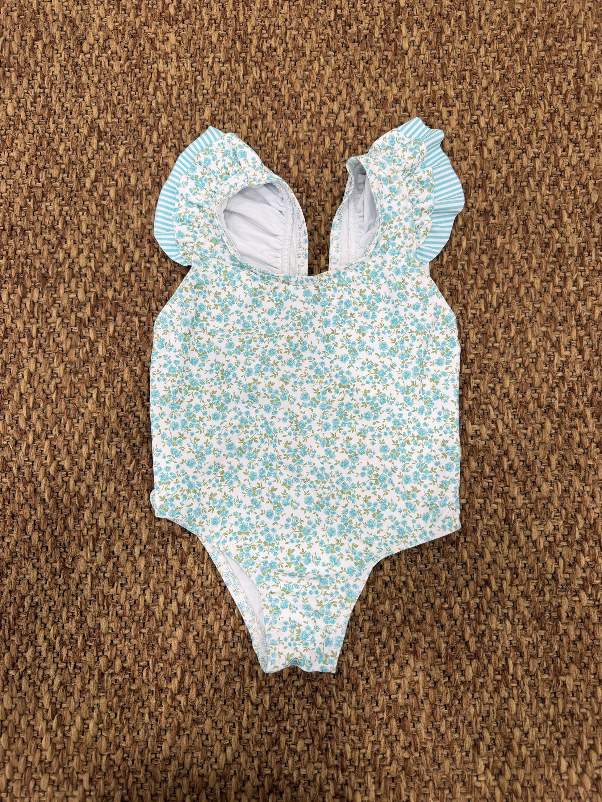 Costume intero bimba a fiori con fiocchi Sardon