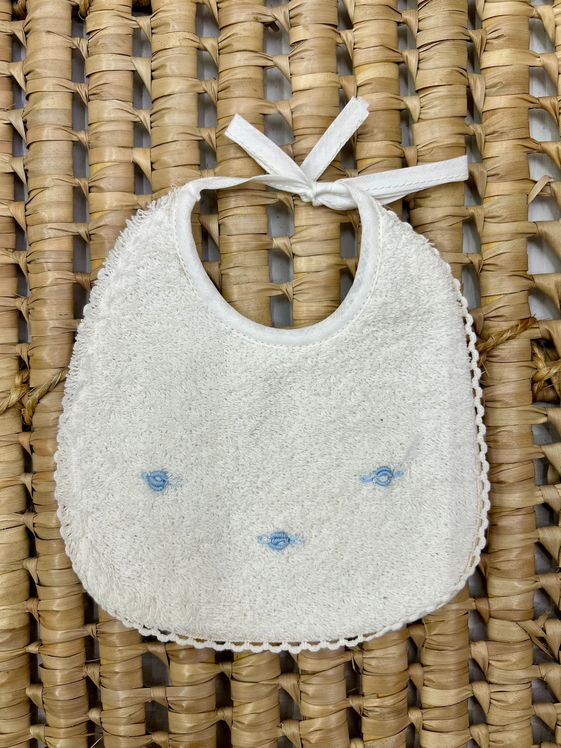 Bavetta neonata in spugna con roselline Artigian Baby