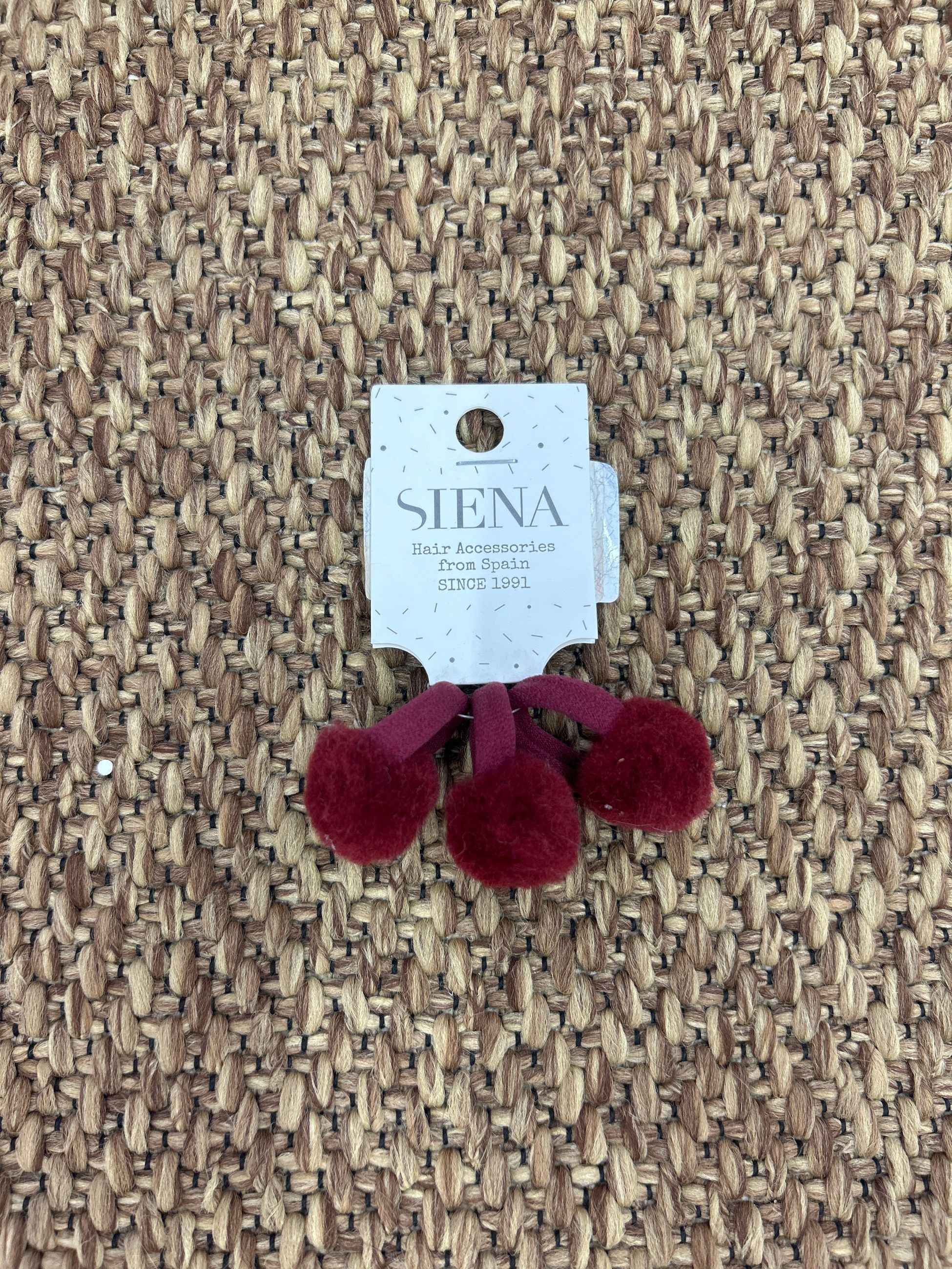 Codino capelli pon pon Siena